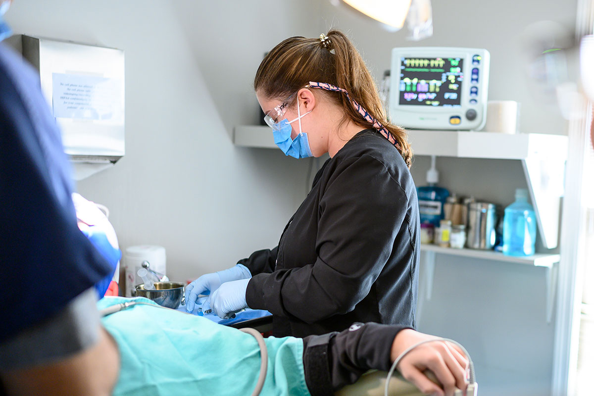 Dr. Mykle Jacobs and staff perform oral surgery on a patient in LaGrange, Georgia.